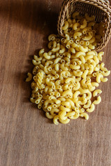 Uncooked fusilli pasta background