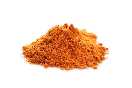 Heap of red pepper powder on white background