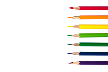 Drawing equipment display same rainbow color or spectrum lighting, Color pencils on isolated white background with copy space and clipping path