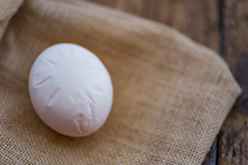 hen's egg with marks on the shell