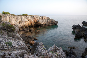 Fototapeta na wymiar Rocky and jaggy inlet along Marina di Camerota’s coastline, Italy
