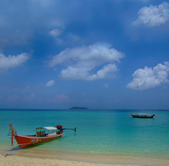 Fototapeta na wymiar Longtale boats at the beautiful beach, Thailand