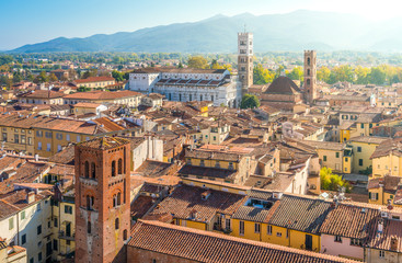 Fototapeta premium Panoramic sight from Torre delle Ore in Lucca, with the Duomo of San Martino in background. Tuscany, Italy.