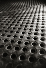 metal plate floor with hole in grayscale mode
