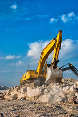 Excavators machine digging the ground in construction site