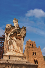 Fototapeta na wymiar sculpture in front of the cathedral of cefalu, sicily, italy