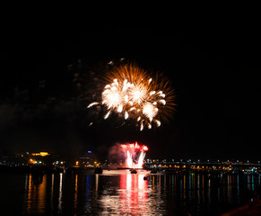 Fireworks of yellow tassels growing out of Golden red fountains
