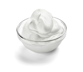 close up of a white beauty cream or yoghurt on white background 