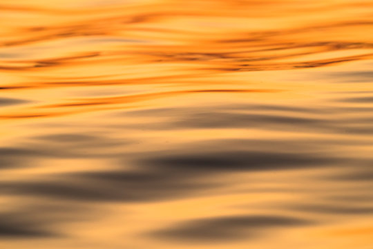 Golden sunset reflected on a river