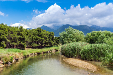 View to the river and mountains near Bar city in Montenegro, nature landscape