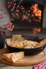 Piece of cake. Apple pie next to the oven.