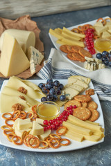 cheese platter on a plate with berries
