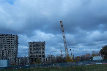 Fototapeta premium abandoned building and crane