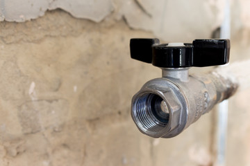 heating pipes in the apartment. valves close-up photo