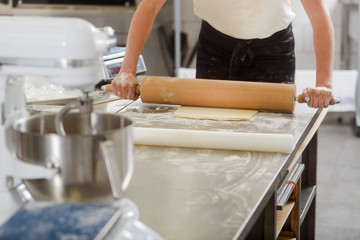 Woman is making dough
