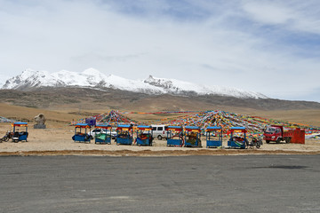 Tibet, China, June, 04, 2018. Sacred place for Buddhists on the side of the road to the pass La Chen La. China, Tibet