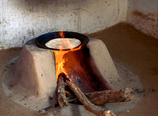 a typical wood fired oven used to cook food in rural india