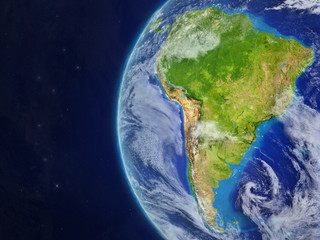 South America from space on beautiful model of planet Earth with very detailed planet surface and clouds.