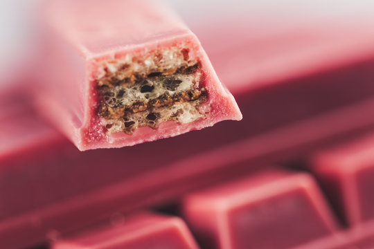 Finger Ruby Chocolate Bar Made From Ruby Cocoa Bean. New Dimension Of Chocolate Sweets.