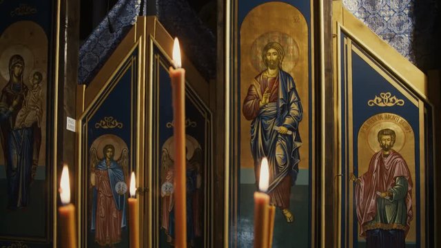 Orthodox icons and candles. Eastern Europe, cca. 2017