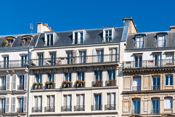 Fototapeta premium Paris, beautiful buildings boulevard des Batignolles, typical parisian facades 