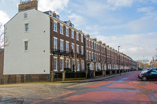 Line Of Smart Almost Identical Terraced Georgian Houses, UK, Disappearing In To The Distance Giving Sense Of Perspective