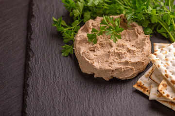 Homemade chicken liver pate with matzo and parsley