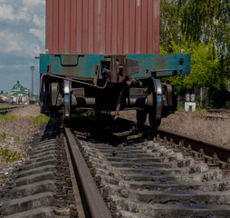 Obraz premium The beginning of a freight train, a freight wagon