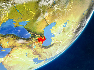 Azerbaijan on model of planet Earth with country borders and very detailed planet surface and clouds.