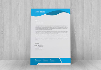 Letterhead Layout with Blue Header and Footer