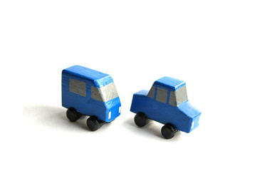 blue toy wooden cars white background