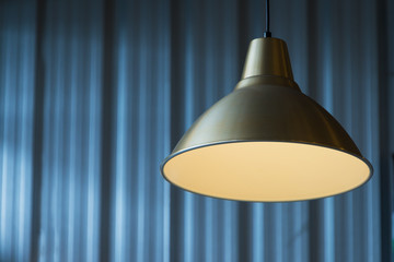 Obraz premium Modern golden metal ceiling lamp interior lighting bulbs decoration contemporary