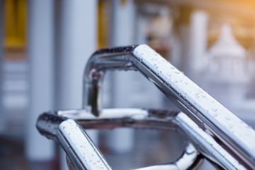 Obraz premium The Wet Railings Of Stainless Steel under The Rain Drops