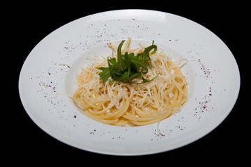 Carbonara Paste. Italian cuisine. On a black background