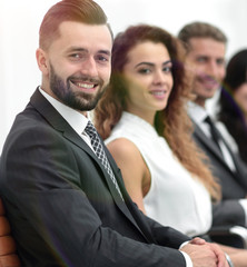 group of business people sitting at the desktop