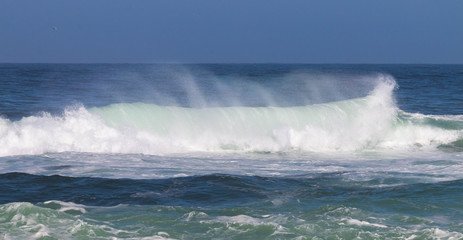 Booming waves against the seashore