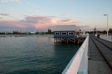 Fototapeta premium Busselton Australia, the jetty is a meeting point for locals who fish and swim in the evening