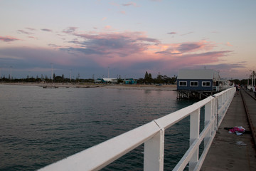 Busselton Australia, the jetty is a meeting point for locals who fish and swim in the evening