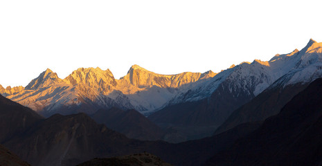 Snowy peak with sunlight isolated over white background.