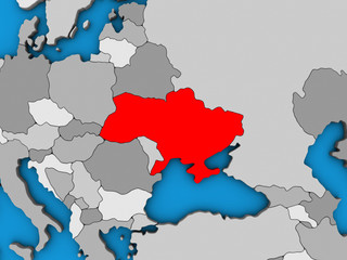 Ukraine on blue political 3D globe.