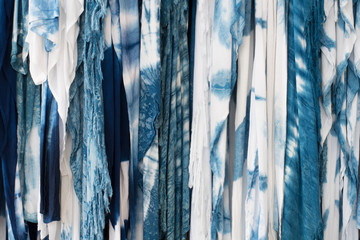The fabric indigo tie dye as a background and texture ผ้า