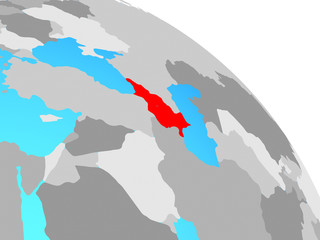 Caucasus region on simple blue political globe.
