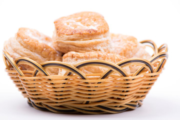 basket with bread isolated on white