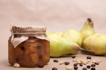 Homemade jam in jar on a beautiful background. Christmas and new year gift. Closeup.