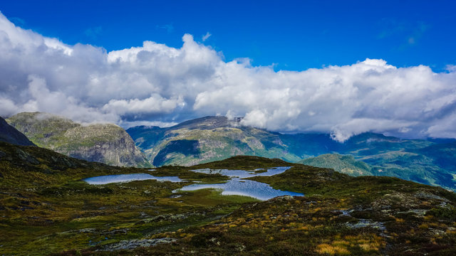 Layer cake of sky, mountains and clouds