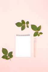 Notepad and leaves