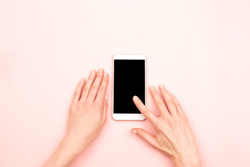Woman hands and a smartphone