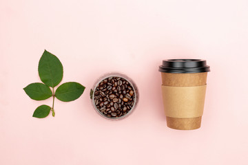 Leaves, coffee beans and a cup