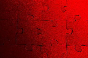 Puzzles laid out on the table in red