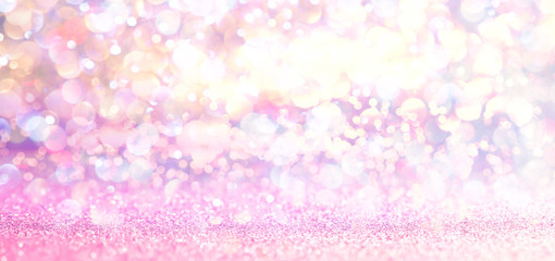 Pink glitter vintage lights background. defocused